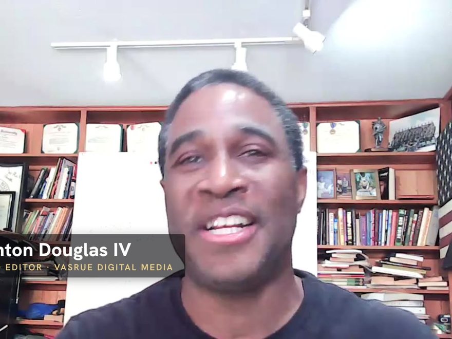 Clinton Douglas IV at his desk in the opening frame of How to Hire Me Directly on Upwork