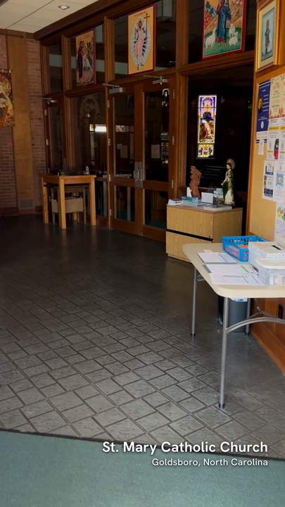 Through the church doors into the narthex, in one continuous take