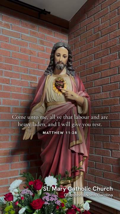 Matthew 11:28 again, over the parish&rsquo;s Sacred Heart statue
